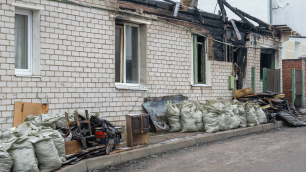 Professional Fire Damage Repair technician working in Spring Valley, WI